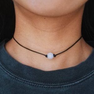Single and triple pearl choker necklaces